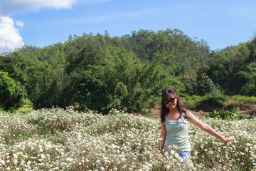 Naklejka na ściany i meble Girl in Chrysanthemum field