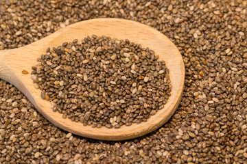 chia seeds with wooden spoon