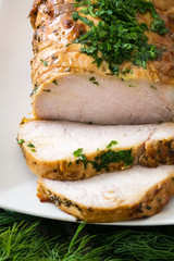 Roasted pork on wooden table
