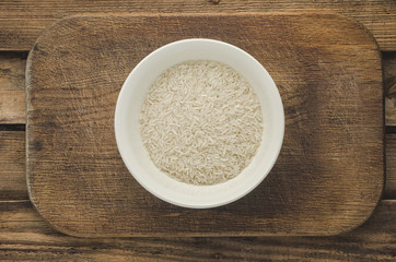 Rice in a plate. Ready for cooking. Healthy food.