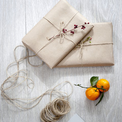 Various items for gift wrapping are on the table.