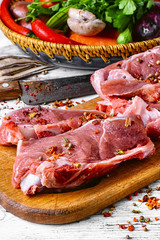 Raw meat on cutting board