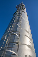 a water tower on a sky background 