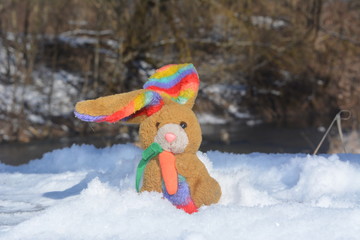Bunny in the snow, children walk in the winter, a lost toy