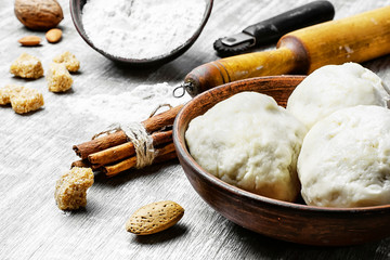 dough with flour and rolling pin