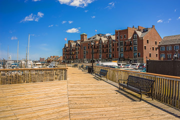 Fototapeta premium Long Wharf and Customhouse Block with ferries in Charles River