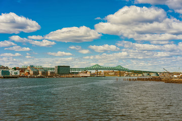 Naklejka premium Skyline of Boston and Tobin bridge in the long distance