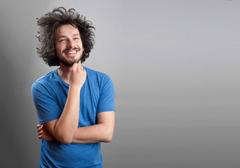 Beautiful man in front of a colored background