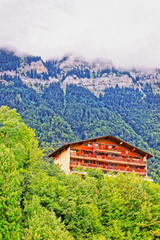 Fototapeta na wymiar Chalet at Brienz village and Brienzer Rothorn mountain Bern Switzerland