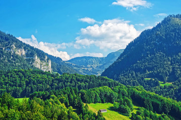 Chalets at Prealps mountains in Gruyere district in Fribourg Swiss