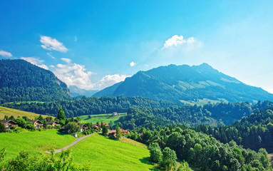 Chalets on Prealps mountains in Gruyere district in Fribourg Swiss