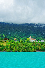 Fototapeta na wymiar Church at Brienz Lake and Brienzer Rothorn mountain Bern Swiss