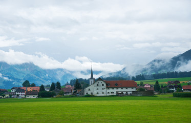 Church in Charmey village on Prealps in Gruyere Fribourg Switzerland