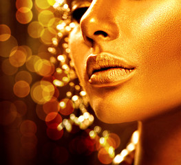 Beauty model girl with golden skin. Fashion art portrait © Subbotina Anna