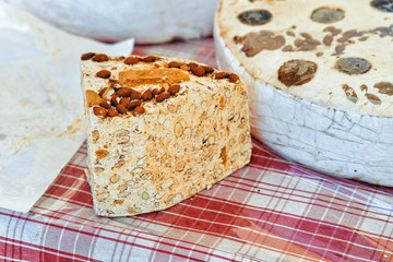Slice of sweet torrone on counter in Ascona