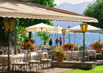 Raamstickers Restaurant Typical restaurant terrace at  Ascona resort in Switzerland
