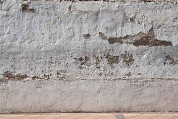 Damaged wall with peeling
