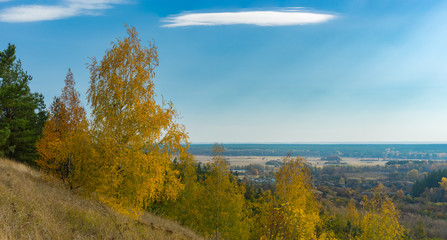Fototapeta premium Seasonal landscape with view on Chervlene village from nearest hill, sumskaya oblast, Ukraine