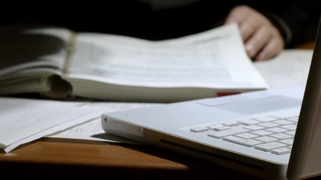 man studying or working in the night 
