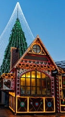 Christmas tree with decorations and souvenir houses Vilnius