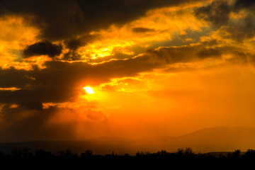 Dramatic clouds at the sunset