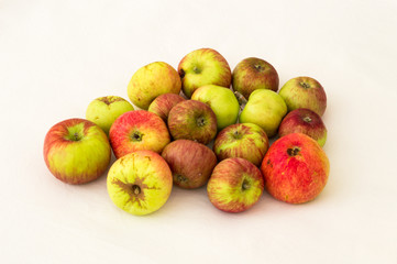 Group of fresh organic apples on a white background