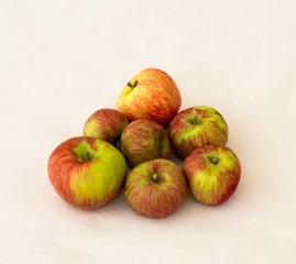 Group of fresh organic apples on a white background