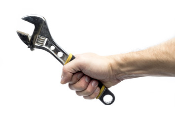 adjustable spanner in hand on a white background