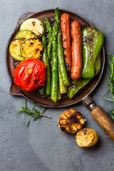  Grilled vegetables zucchini, asparagus, bell pepper, sausages on grill pan © lblinova