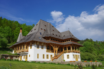 Traditional wooden house in Barsana monastery. Maramures region, Romania