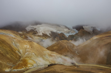 Kerlingarfjoll or The Ogress' Mountains, a volcanic mountain range situated in the highlands of Iceland. Steam from inside the earth