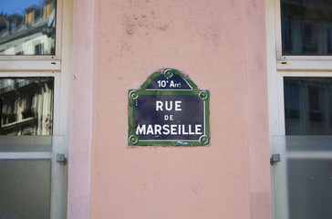 View of street sign (Rue De Marseille) in Paris.