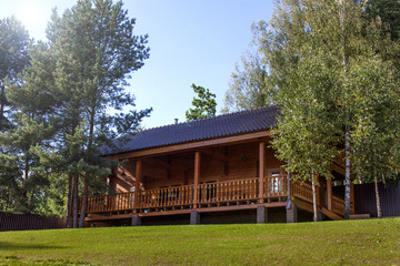 Fototapeta na wymiar Country house from timber profiling