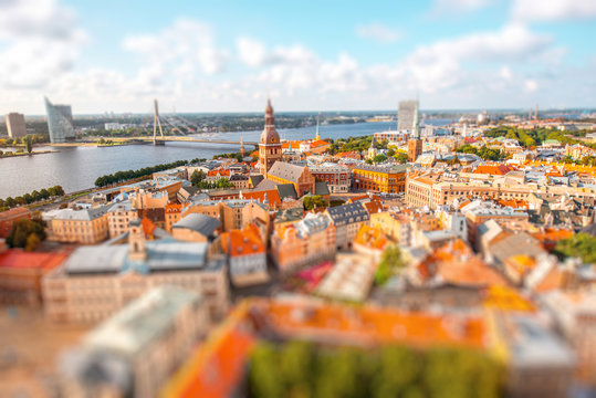 Panoramic aerial view on the old town of Riga city, Latvia. Blurred image with tilt-shift effect