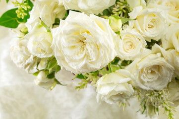bouquet of white roses on a cloth