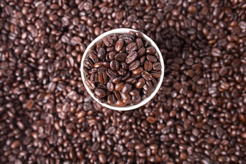 Coffee beans and cup