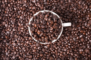 Coffee beans and cup