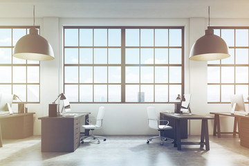 Side view of a row of tables, toned