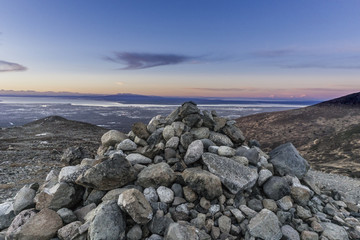Fototapeta na wymiar Pile of Rocks Overlooking Coast