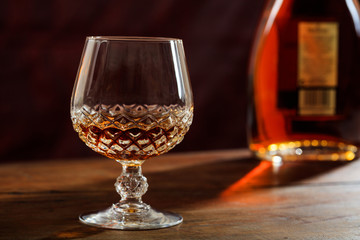 Bottle and crystal glass of cognac