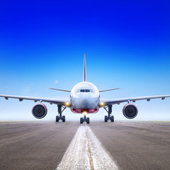 Fototapeta na wymiar airliner on a runway