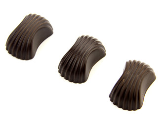 Chocolate candies isolated on white background.
