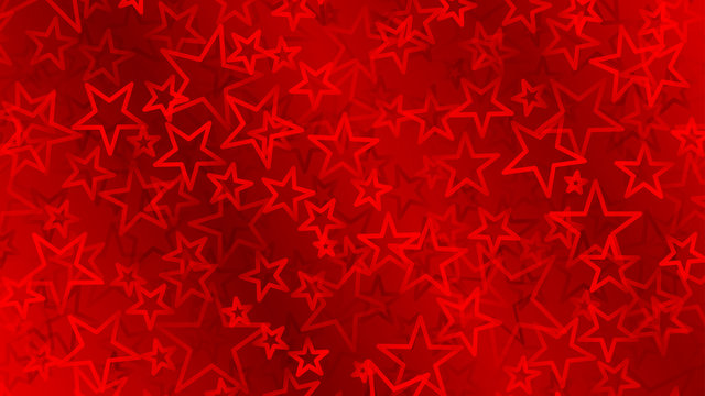 Red abstract background of small stars