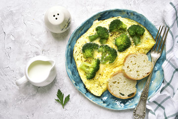 Omelet stuffed with broccoli and cheese.Top view.