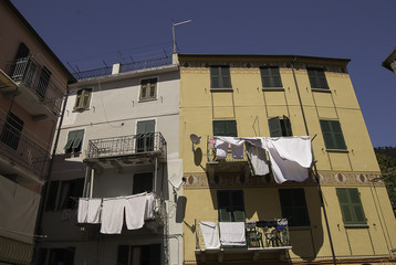 Clothing hanging out to dry on a line in Italy