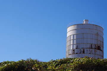 Under the blue sky of cement tank