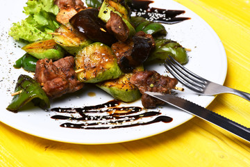 plate with meat and vegetables