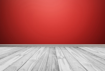 White wood floor panels with red wall background