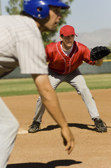 Young baseball players practicing before a match