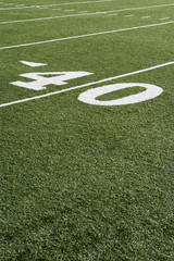 40 yard line on American football field with artificial turf